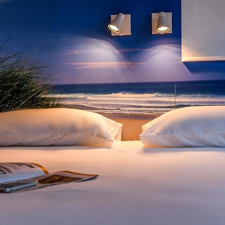 Les Vagues Hotel Restaurant บิสการ์รอส-ปลาจ ภายนอก รูปภาพ