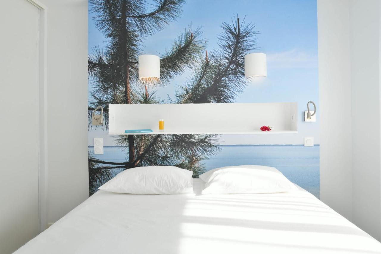 Les Vagues Hotel Restaurant บิสการ์รอส-ปลาจ ภายนอก รูปภาพ