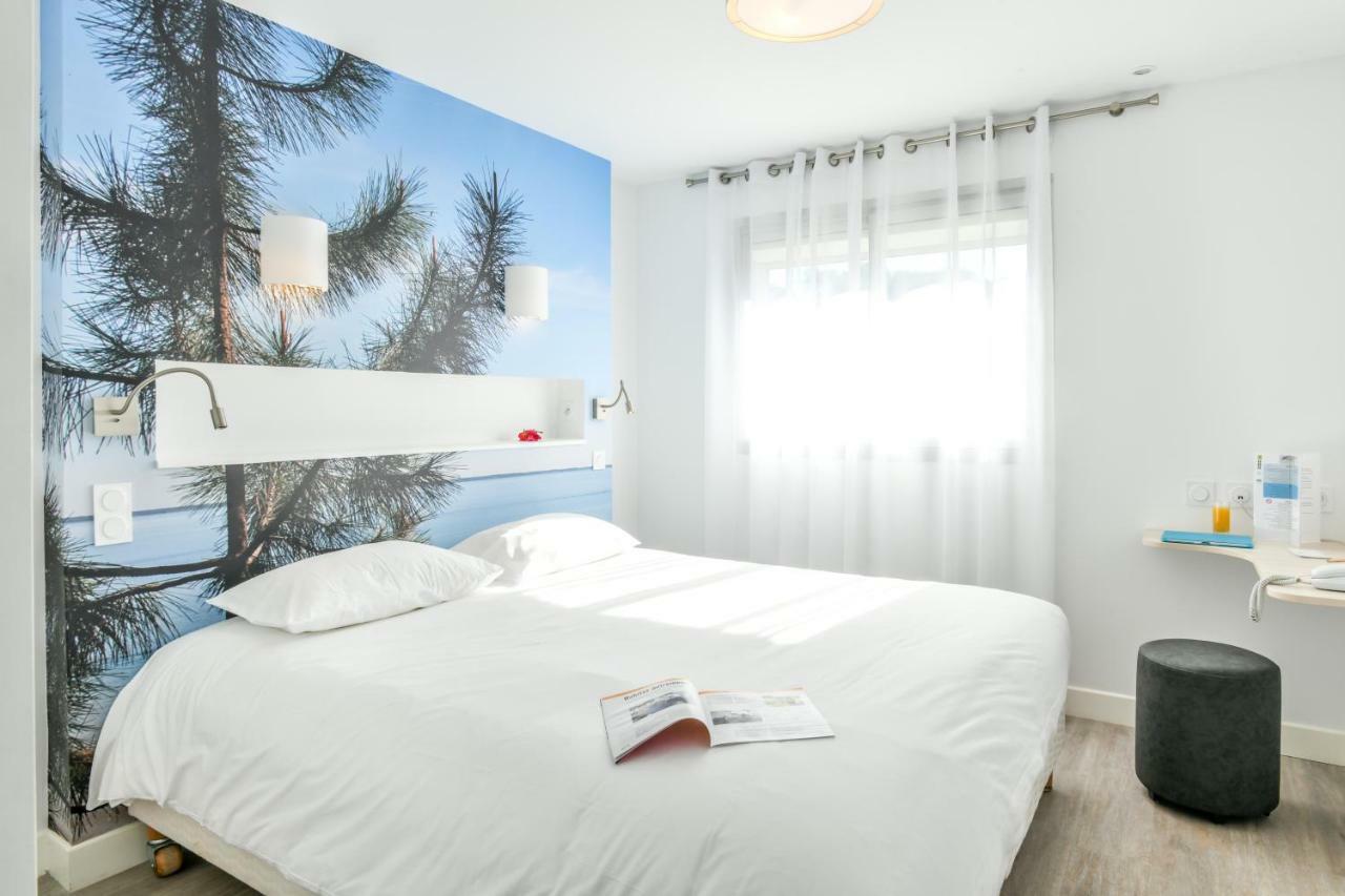 Les Vagues Hotel Restaurant บิสการ์รอส-ปลาจ ภายนอก รูปภาพ