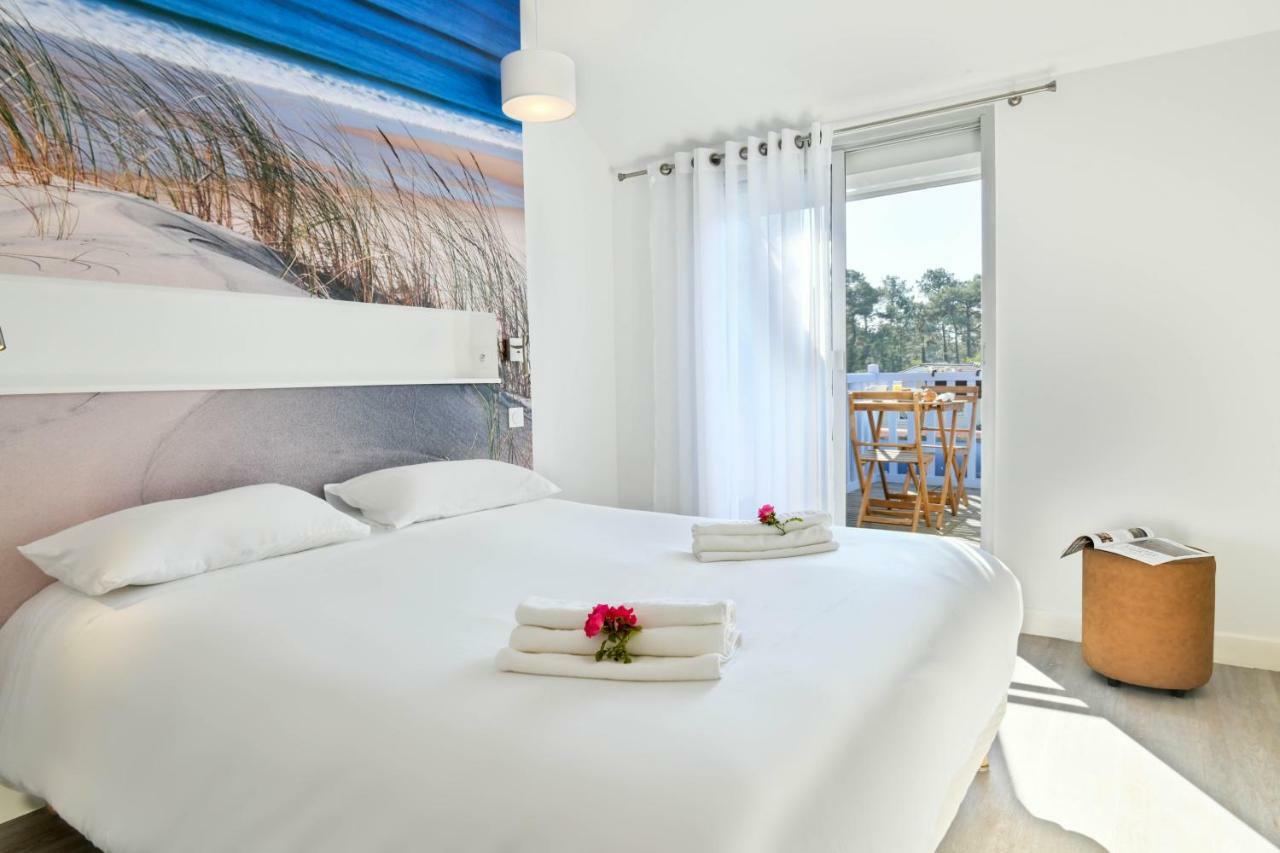 Les Vagues Hotel Restaurant บิสการ์รอส-ปลาจ ภายนอก รูปภาพ