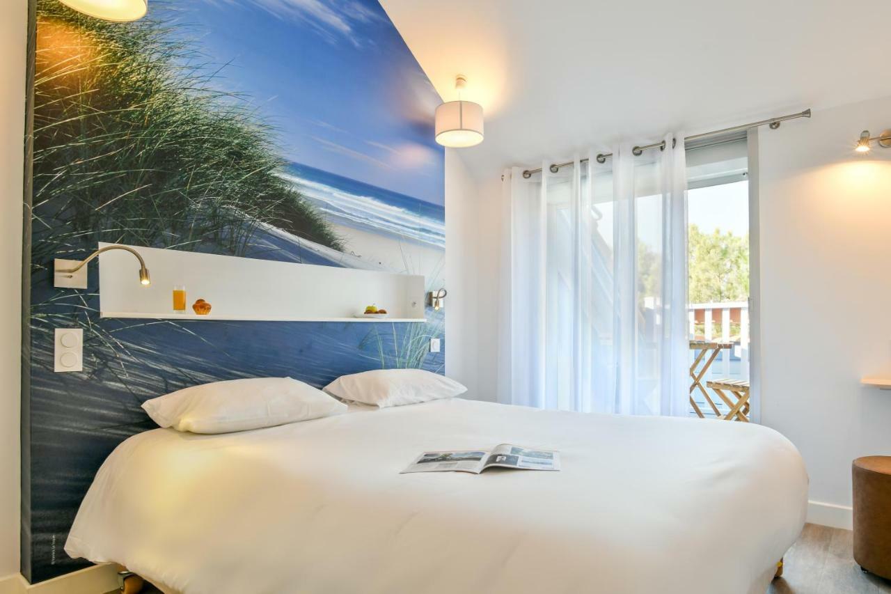 Les Vagues Hotel Restaurant บิสการ์รอส-ปลาจ ภายนอก รูปภาพ